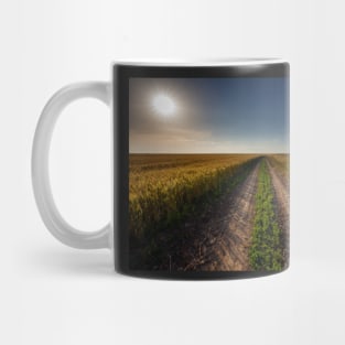 Rural road through wheat field Mug